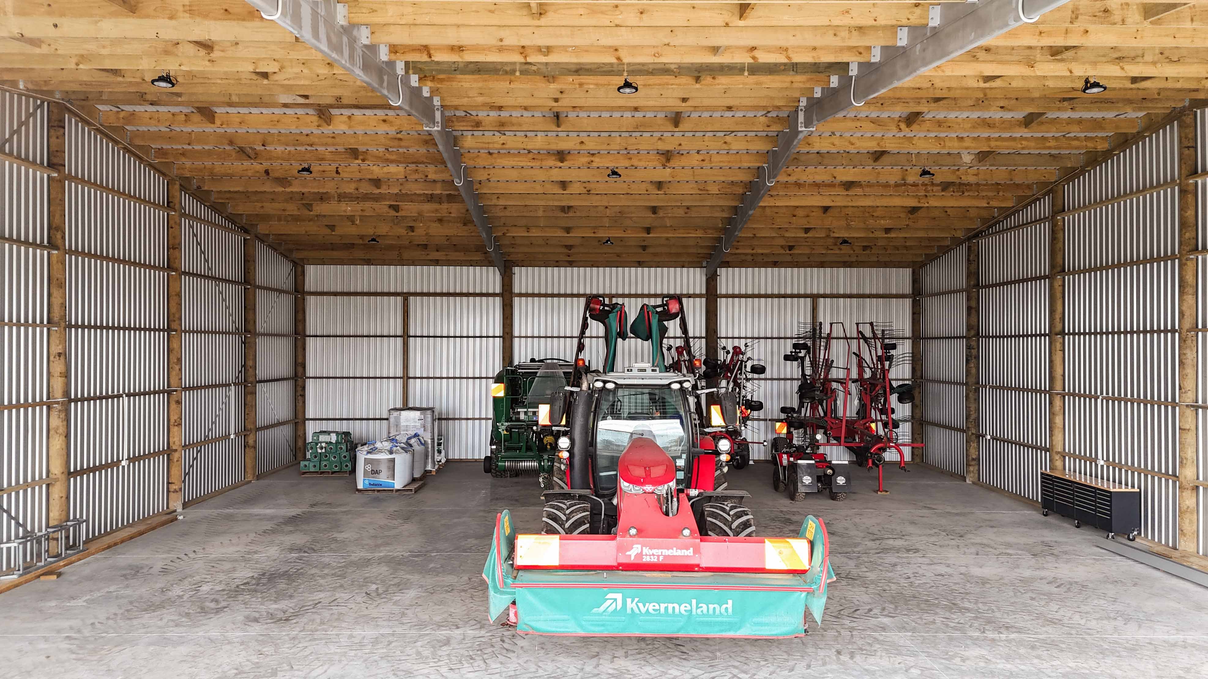 Alpine implement storage enclosed bays