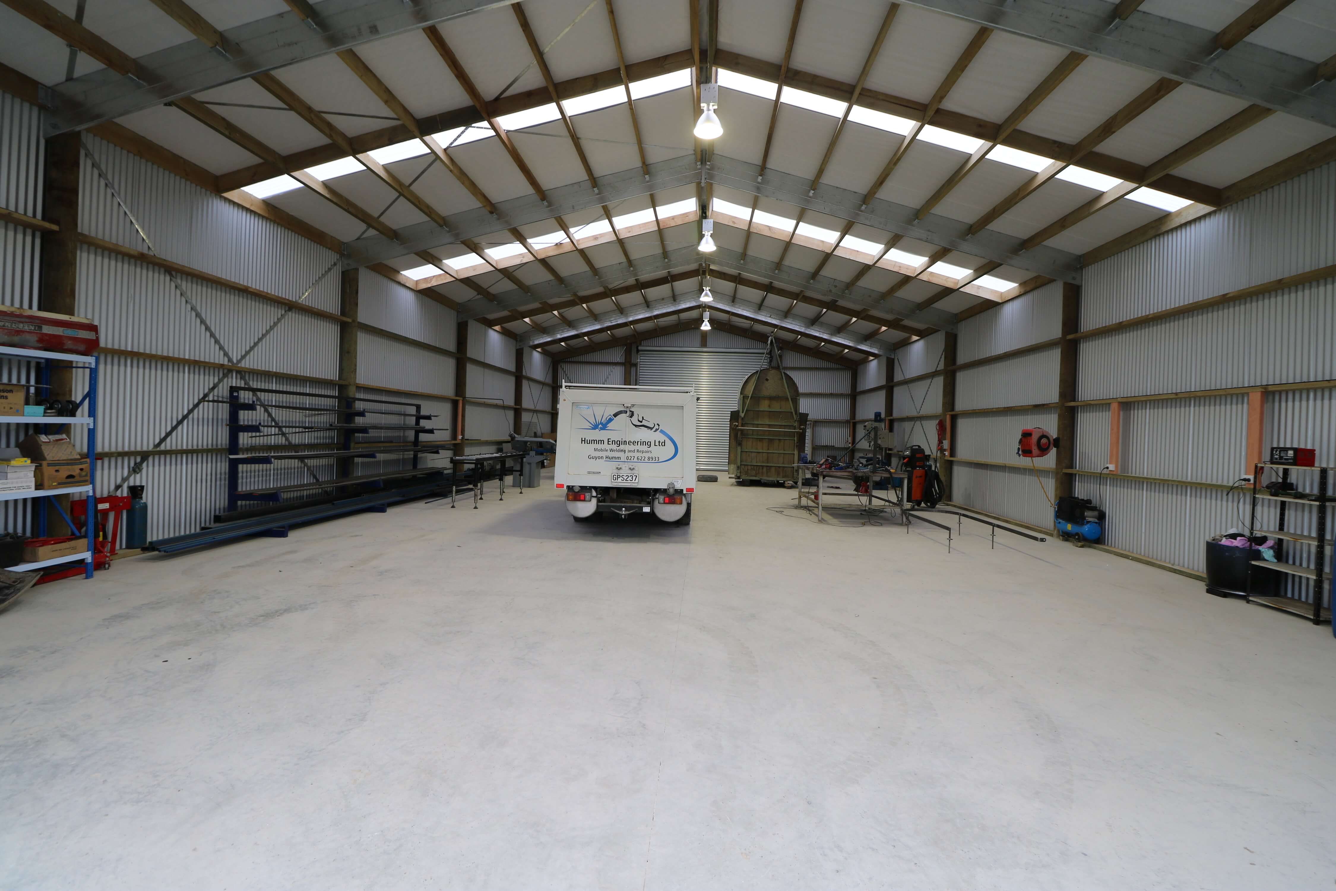 This large lockup shed has all the space to keep a large collection of vehicles safe
