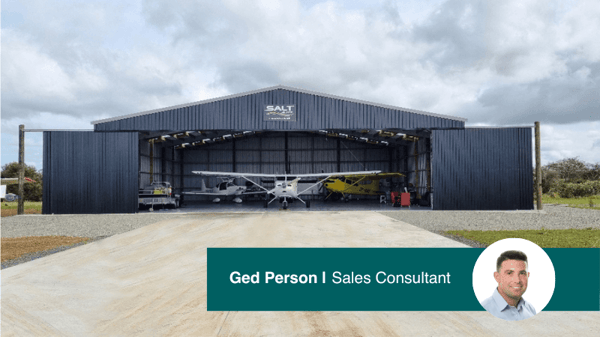 Aircraft hangar with custom doors