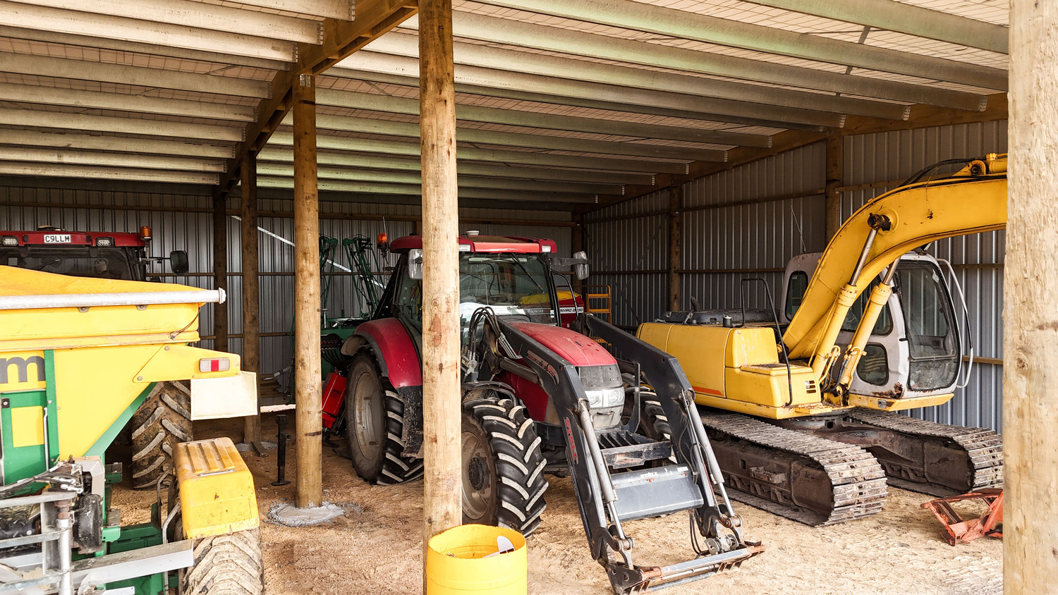 Alpine shed with wide bays for implement storage